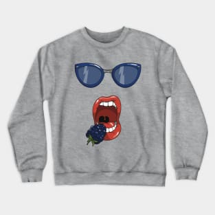 Mouth about to eat a blueberry while wearing matching blue sun glasses. Crewneck Sweatshirt